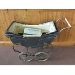 A 1950's dolls pram plus a boxed Chad Valley washing machine