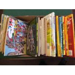 A box of various childrens annuals