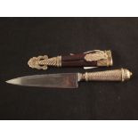 A vintage 'Tandil El Chaja' Gaucho knife with white metal mounted leather sheath