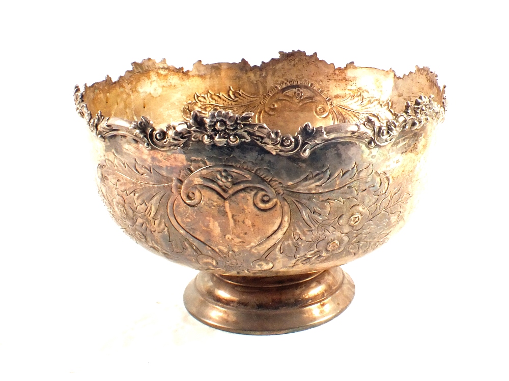 A floral embossed silver plated punch bowl