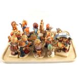 A tray of various Hummel figurines