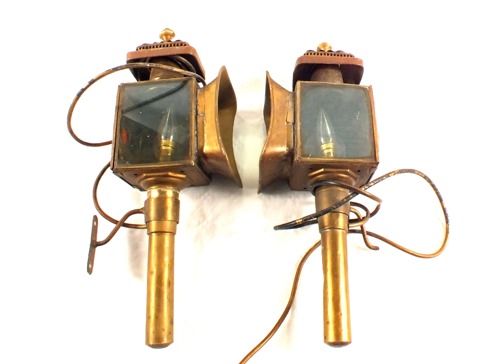 A pair of brass carriage lamps (converted)