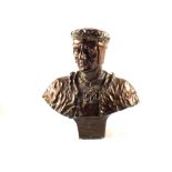 A copper clad plaster bust of a scholar or cleric,