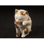 A 19th Century Japanese porcelain cat (cracked)