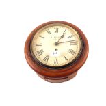 A circular mahogany dial clock marked Dearling High St,