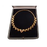 A superb Boodles & Dunthorne 18ct gold 'hug design' necklace set with diamonds,