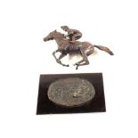 A David Conner 1985 bronze of a racehorse titled 'Champion Finish' (base detached)