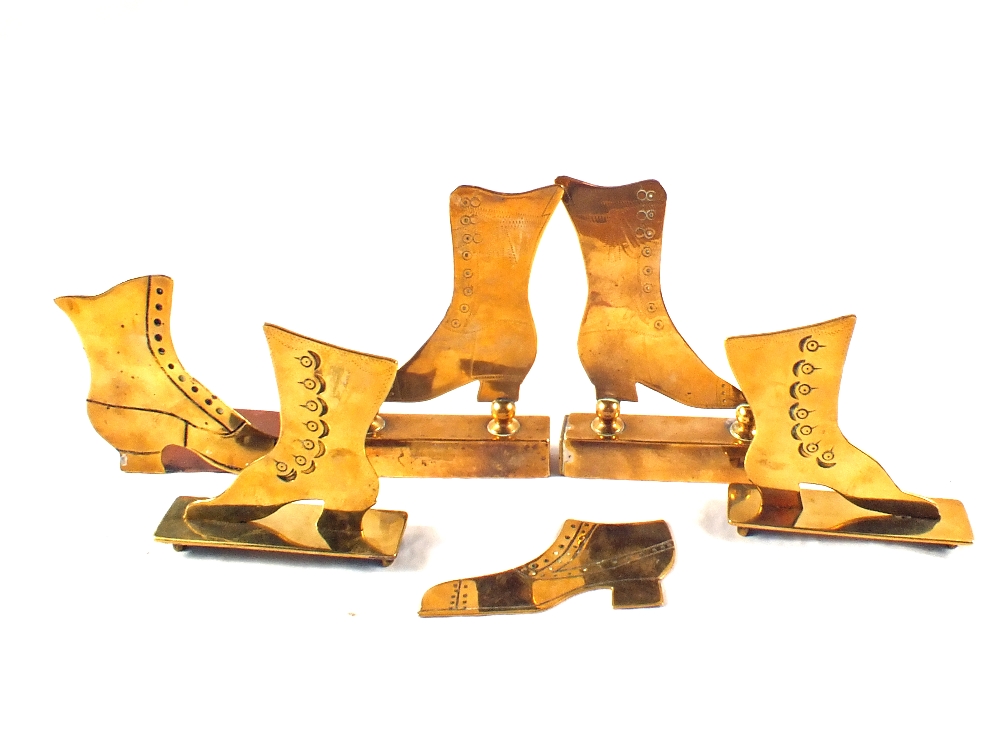 Six 'Trench Art' style brass shoes