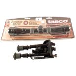 A Tasco rifle scope 4x32 with a bipod