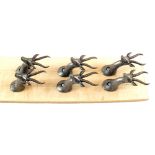 Three pairs of metal stag head gun hanging mounts