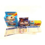 Boxed Corgi and Matchbox models,