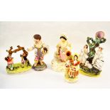 Four 19th Century Staffordshire figurines plus a Bisque boy (two as found)