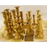 Eight pairs of Victorian brass candlesticks,