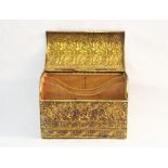 An Art Nouveau three section embossed brass stationery box