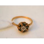 A 9ct gold diamond and emerald ring,