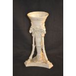 A 19th Century Parian trumpet vase with rams head mounts and hoofed legs (as found)