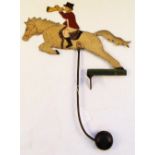 A vintage painted huntsman on horse back balance toy (no base)