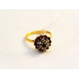 An 18ct gold ruby and diamond ring,