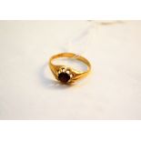 A 9ct gold garnet signet ring,