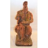 John Aldous, Beccles Pottery and Brickworks clay figure of a seated scholar,