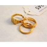 An 18ct gold signet ring (worn),