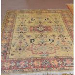 A machine made floral Persian pattern carpet,