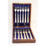 A mahogany cased set of silver plated fish eaters