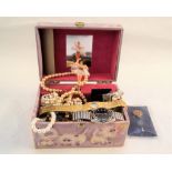 A musical jewellery box and contents