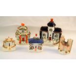 Four 19th Century house ornaments plus one castle