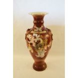 A Satsuma brown glazed vase with figure and floral decoration,