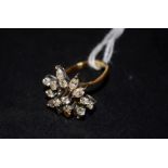 An 18ct gold diamond cluster ring,