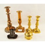 Four 19th Century brass and copper candlesticks,