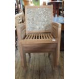 A set of six hardwood slatted seat conservatory chairs with unusual backs made up of circles of cut