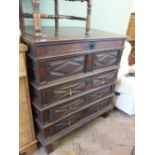 An unusual 19th Century oak chest with rising top over three long drawers with Jacobean style