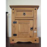 A pair of pine bedside cabinets