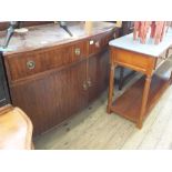 A mahogany bow front sideboard