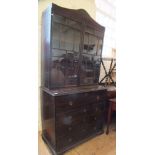 A 19th Century mahogany astral glazed two door secretaire bookcase on graduated four drawer base