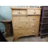 A Victorian pine chest of two short and three long drawers