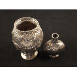 A small ornate Dutch silver vase, marks to base plus a small silver scent bottle,