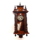 A mahogany regulator wall clock