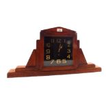 A mahogany cased square faced dial clock