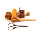 Needlework items to include metal coffee grinder, tape measure, treen thimble holder,