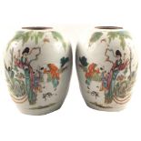 A pair of 19th Century Chinese vases with woman and child decoration and calligraphy,