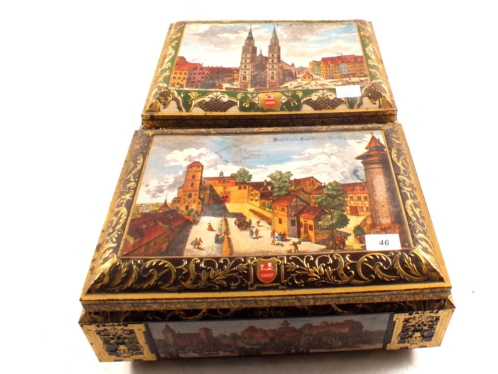 Two large Otto Schmidt tins with Medieval town view decoration