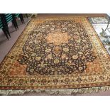 A machine made floral Persian pattern carpet