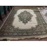 A machine made floral Persian pattern carpet