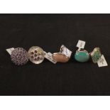 A group of five silver stone set rings including amethyst, agate,