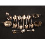 A selection of silver including teaspoons, pepper,