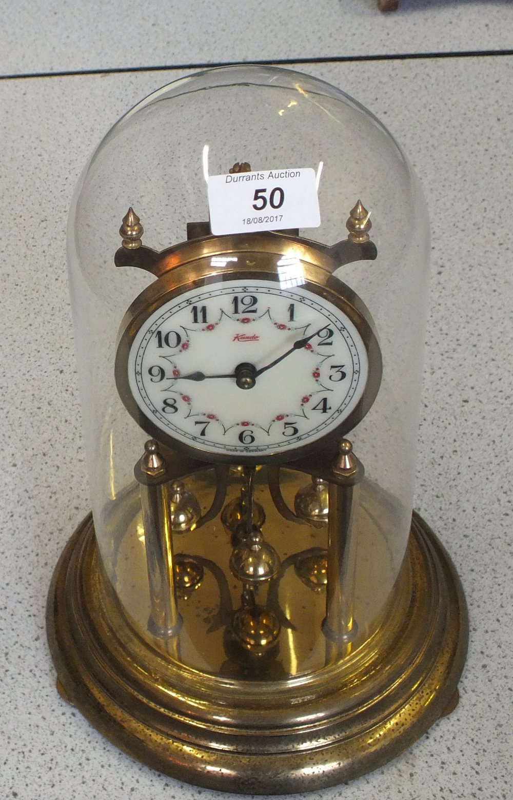 Kenzis brass dome clock