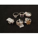 Six silver rings set with stones including morganite, amethyst,